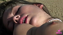 Juliette C sprawls naked on the warm sand, her tanned body glistening under the intense sun. She spreads her thick thighs wide, exposing her plump, pink pussy lips to the salty sea breeze!