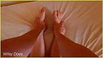 Massage and rub oil into the feet of this nude MILF