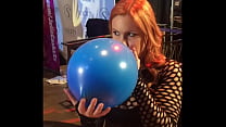 Edyn Blair blows up a giant balloon