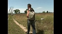 Hardcore gay action with two guys sucking and fucking in the middle of a field