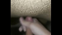 Jerking off soft penis in room