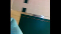 Busty MILF sucking big dick in rest area bathroom