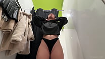Hot brunette with a big ass tried on clothes on her naked body. Fitting room.