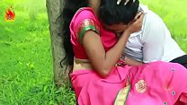Couple kissing in the park