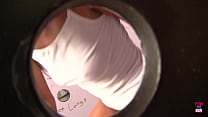 The individual is a brunette with tattoos In the public restroom, Randy Wright engages in sexual activity by engaging in genital sex