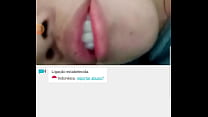 Indiana com tesao no meu pau olhando intesamente no chat