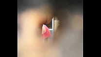 Vecina cambiandose