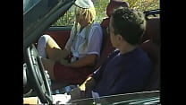 Blonde nympho rides a hard thick cock on the back of a convertible