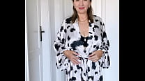 Mature busty MILF tries to seduce you. Close-up pussy.