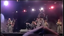 Black girl takes a piss on a man at live concert