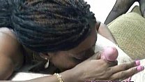 Ebony swinger Honey swallows a stiff white cock