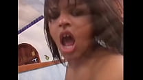 Dude puts his toes into black tranny's ass then she lowers herself onto his pole
