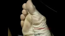 Sexy redhead pornstar Annie Body's sexy feet on display