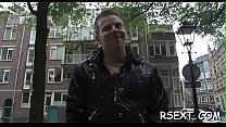 Black angel sucks a large pole