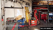 Watch this sexy girl masturbate with her dildo in the auto shop