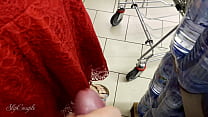 Slut jerked a big cock in the middle of a shopping mall / supermarket - public and risky