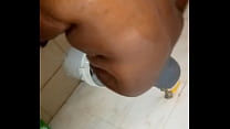 African woman bathing