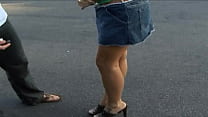 While giving the ice cream man and upskirt of her panties as she sits in the back of his...