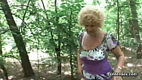 Curly blonde haired Hungarian granny Francsina meets stranger Gabor in the woods in the middle of the day and strips for him then sucks and fucks