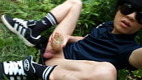 This gay Asian twink wanks his cock with a lubed Quickshot in the wilderness, he cums after an orgasm ruined by precum