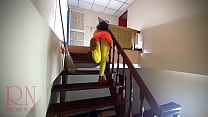 HALLOWEEN Witch in Rtgina Noir witch with pumpkins and a broom. Regina Noir Velma Dinkley Yellow pantyhose Performing in old house at stairway  HALLOWEEN Witch in Rtgina Noir witch with pumpkins and a broom. Regina Noir Velma Dinkley Yellow pantyhose Performing in old house at stairway