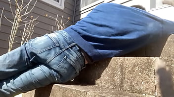 Mayofascial stretch of leg and side on cement steps