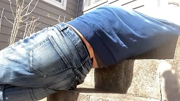 Mayofascial stretch of leg and side on cement steps