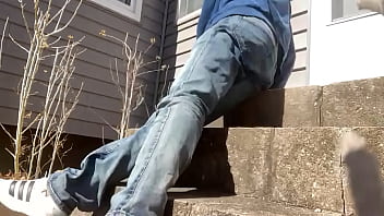 Mayofascial stretch of leg and side on cement steps