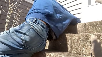 Mayofascial stretch of leg and side on cement steps