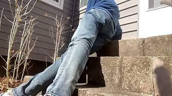 Mayofascial stretch of leg and side on cement steps