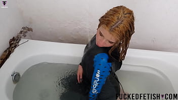 Blonde skinny neoprene bathtub fetish