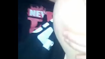Horny bitch sucking her tittie