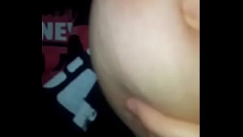 Horny bitch sucking her tittie