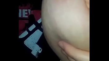 Horny bitch sucking her tittie