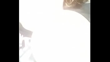 Horny bitch sucking her tittie