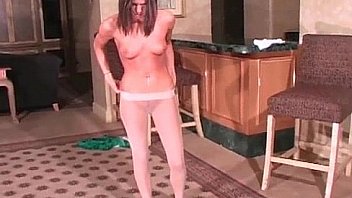 Sexy brunette girl is stripping