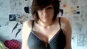 Busty amateur touches her breasts and nude body