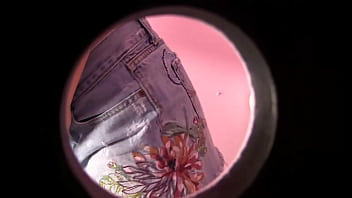 Peek in on talia palmer through a glory hole before a cock gets shoved through it