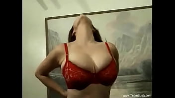 Hot raven haired beauty getting naked