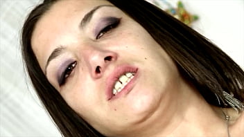 Hot hunk fucks a brunette sexy in bed