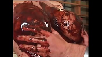 Busty blonde enjoys sex with chocolate on her big tits