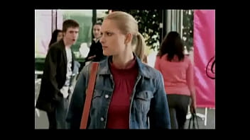 Blonde girl with her miniskirt stuck in her panties