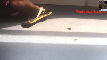 Ebony feet on bus