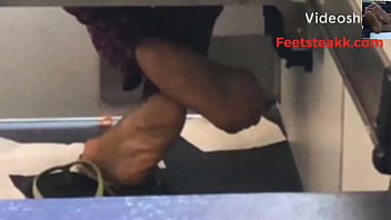 Ebony feet on bus