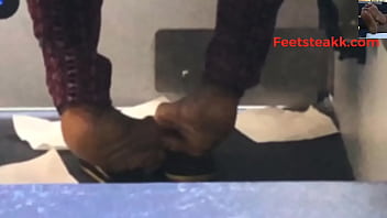 Ebony feet on bus