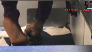 Ebony feet on bus