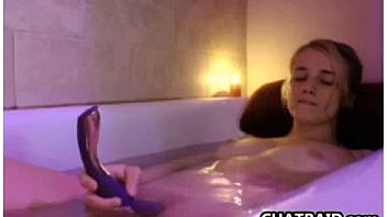 Teen masturbates in the bath tub