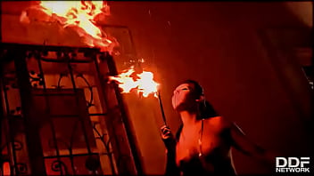 Flaming hot sexy pyromaniac plays with fire