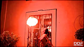 Flaming hot sexy pyromaniac plays with fire