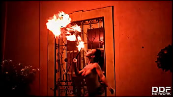 Flaming hot sexy pyromaniac plays with fire